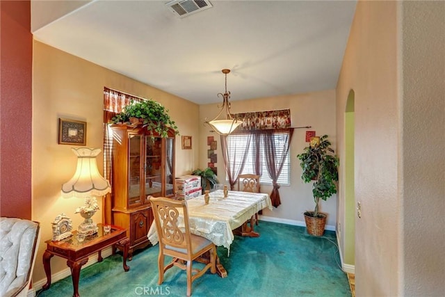 view of carpeted dining room