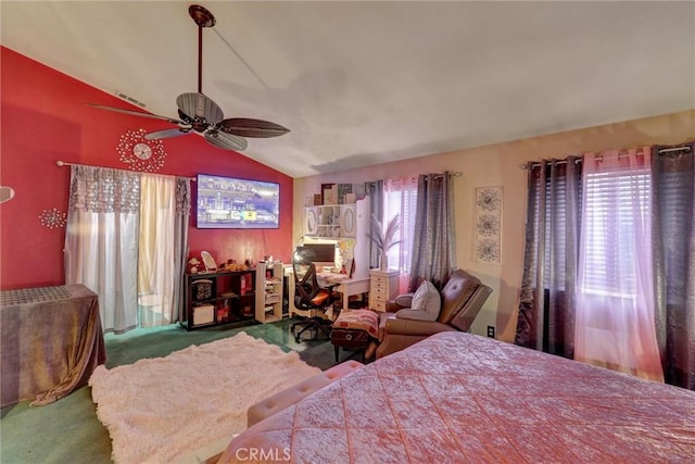 bedroom featuring carpet, ceiling fan, and vaulted ceiling