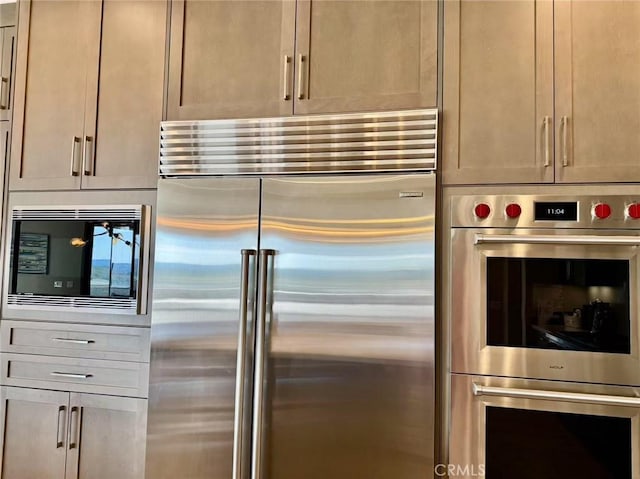 kitchen featuring built in appliances