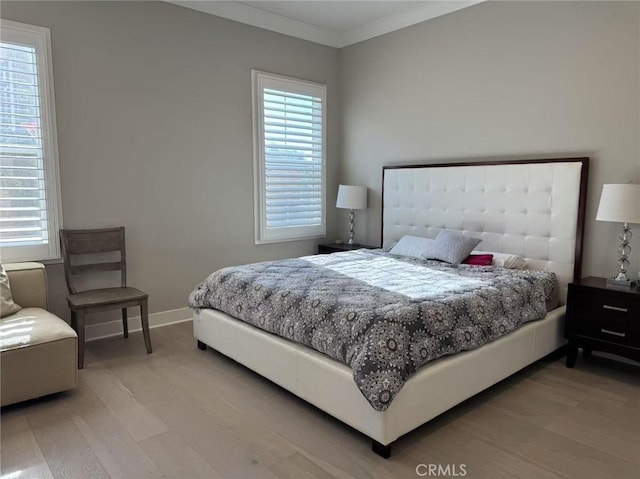 bedroom featuring light hardwood / wood-style floors