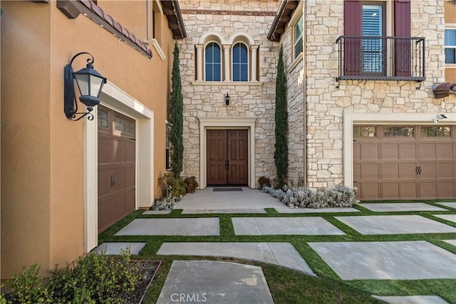 doorway to property featuring a garage