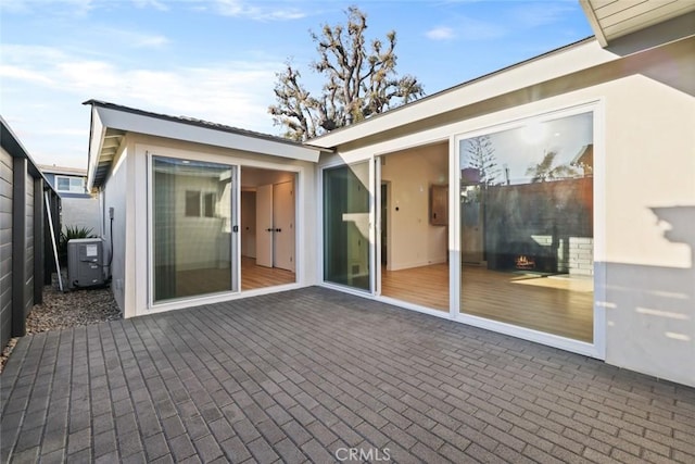 view of patio featuring cooling unit