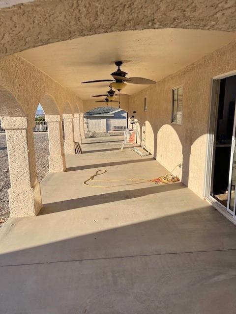 view of patio with ceiling fan