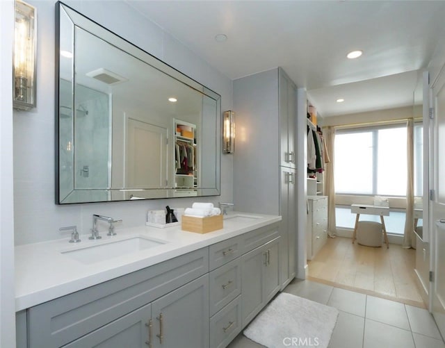 bathroom featuring vanity and tile patterned floors