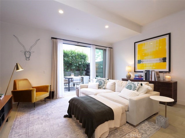 bedroom with access to exterior and light wood-type flooring