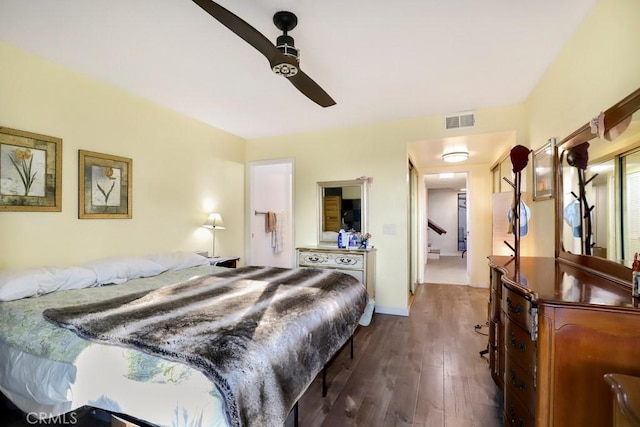 bedroom featuring ceiling fan and dark wood-type flooring