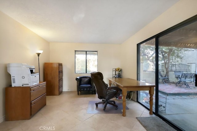 home office featuring light tile patterned flooring