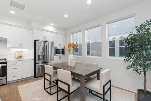 dining area featuring light hardwood / wood-style flooring