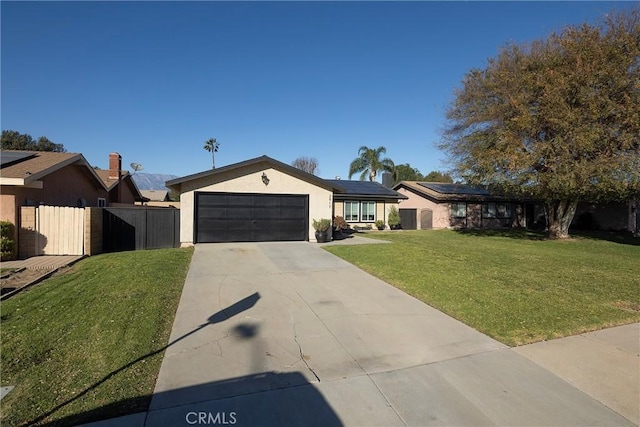 single story home with a front yard and a garage