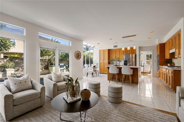 living room featuring light tile patterned floors