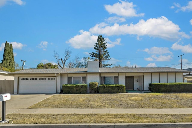 ranch-style home with a garage