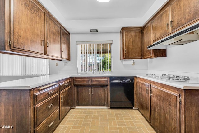 kitchen featuring dark brown cabinetry, black dishwasher, sink, kitchen peninsula, and white gas cooktop