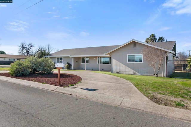 single story home featuring a front lawn