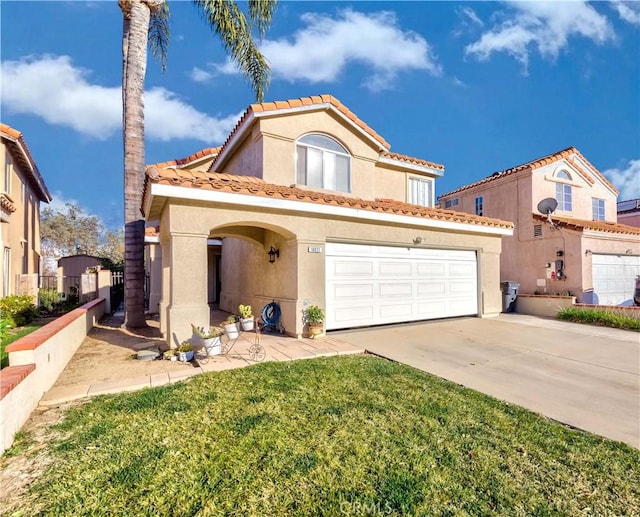 view of front of property featuring a front lawn and a garage