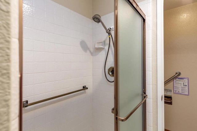 bathroom featuring walk in shower