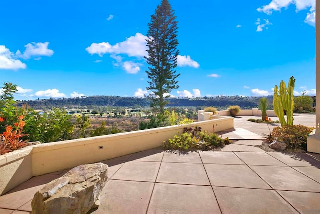 view of patio with a mountain view