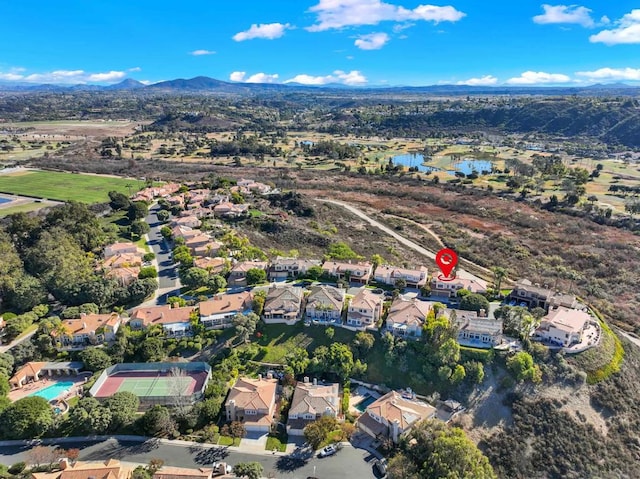 bird's eye view featuring a water and mountain view