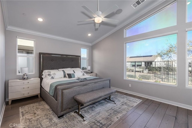 bedroom with ceiling fan, multiple windows, ornamental molding, and lofted ceiling