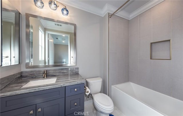 full bathroom with toilet, vanity, crown molding, and tiled shower / bath