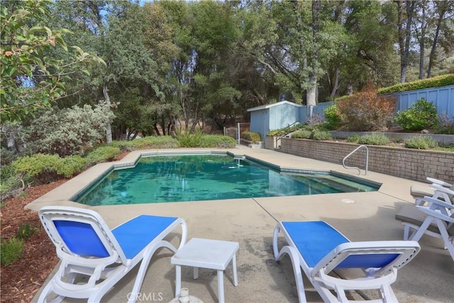 view of pool featuring a patio