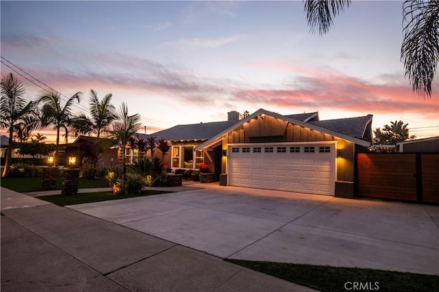 view of front of property featuring a garage