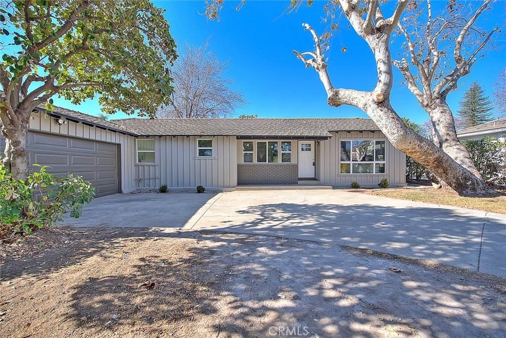 ranch-style home with a garage