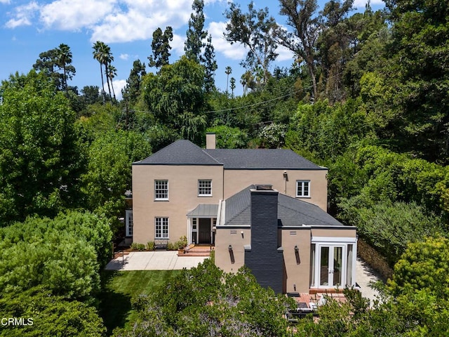 back of house featuring french doors and a patio area