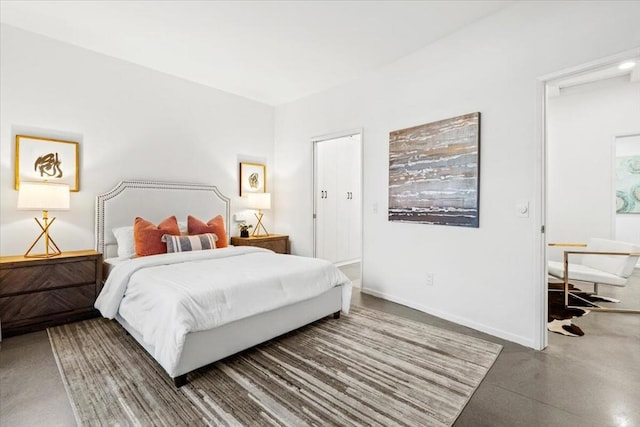 bedroom with concrete floors