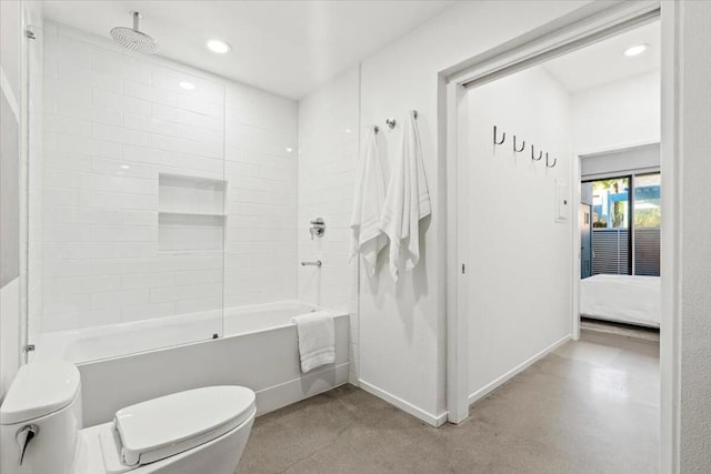 bathroom with toilet and shower / bathing tub combination