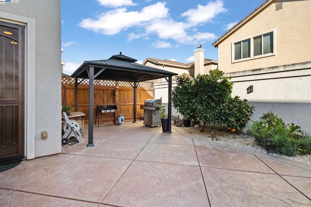 view of patio featuring a gazebo and area for grilling