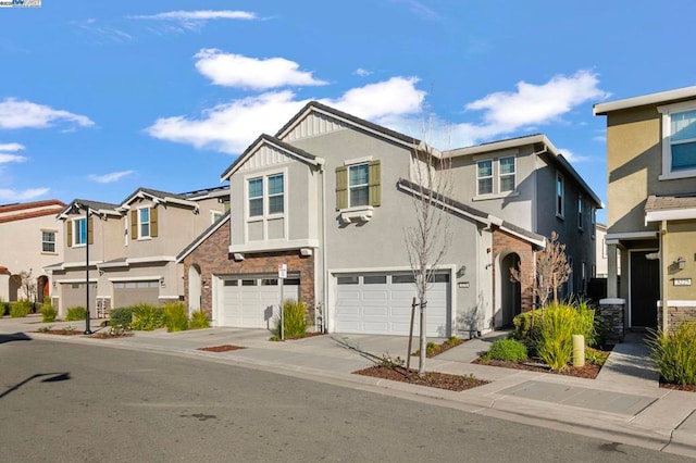 townhome / multi-family property featuring a garage