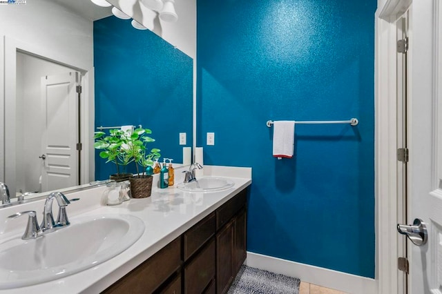 bathroom featuring tile patterned floors and vanity