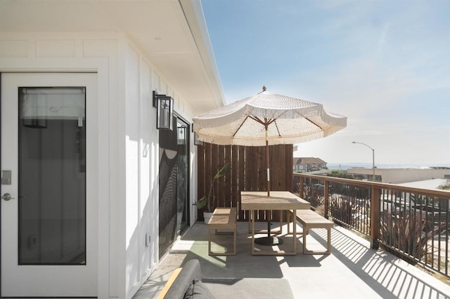 balcony featuring outdoor dining space