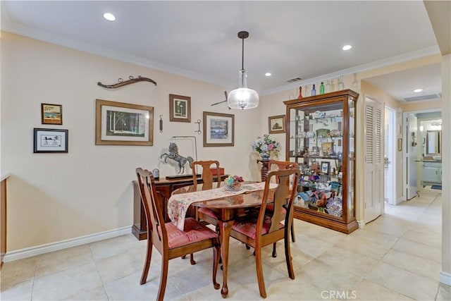 dining space featuring ornamental molding