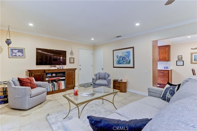 living room with ornamental molding