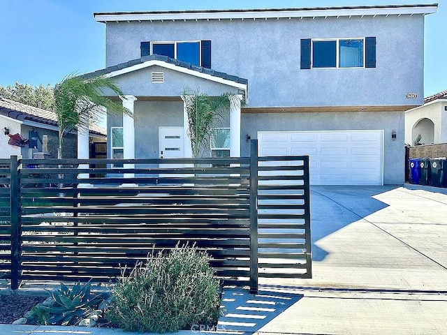 view of front of property featuring a garage