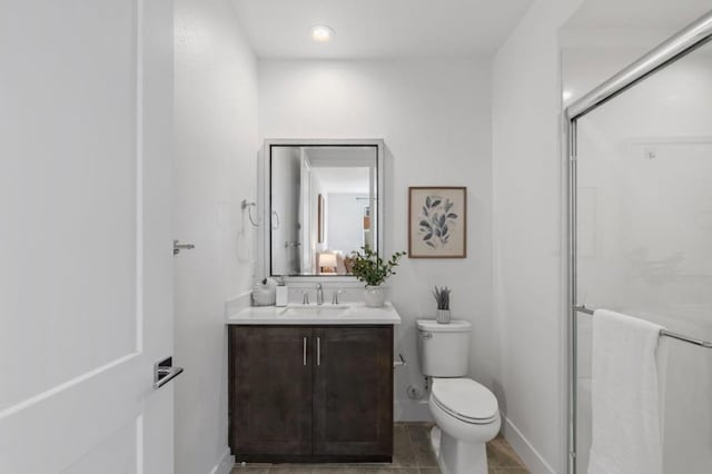 bathroom with tile patterned floors, walk in shower, toilet, and vanity