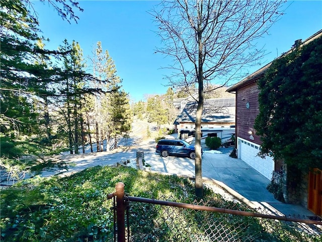 view of yard featuring a garage