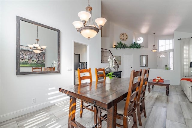 dining space featuring an inviting chandelier