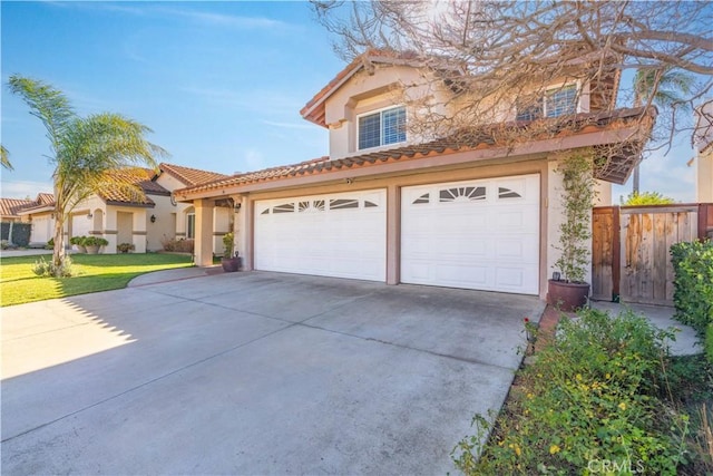 view of front of property with a front lawn and a garage