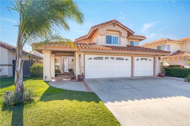 mediterranean / spanish-style house with a front yard and a garage