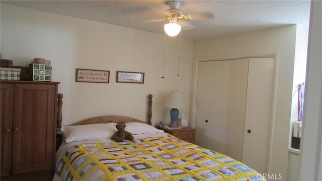 bedroom with a closet, ceiling fan, and a textured ceiling