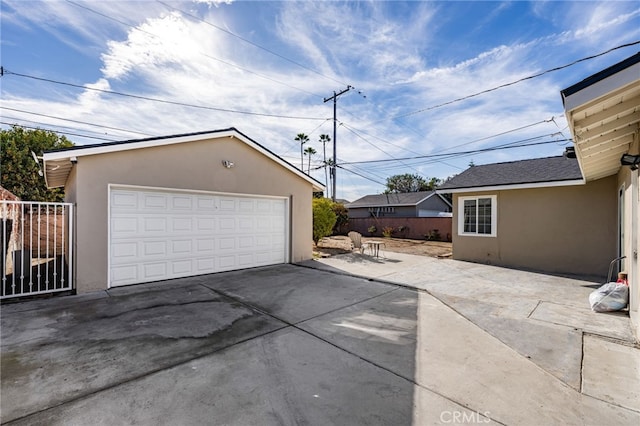 detached garage with fence