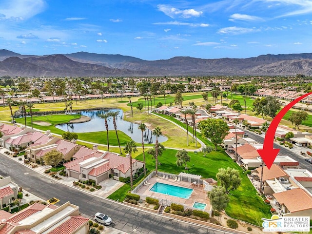 bird's eye view featuring a water and mountain view