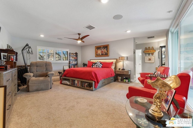 bedroom with light colored carpet and ceiling fan