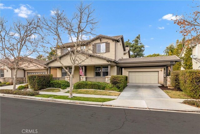 craftsman-style home featuring a garage