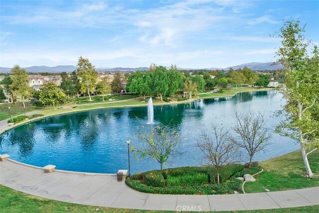 view of pool featuring a water and mountain view