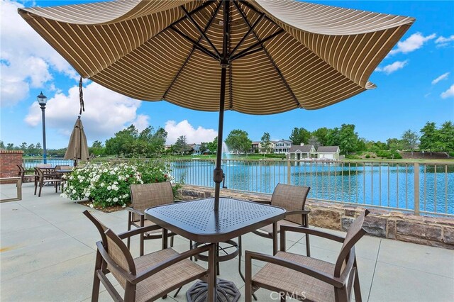 view of patio / terrace with a water view