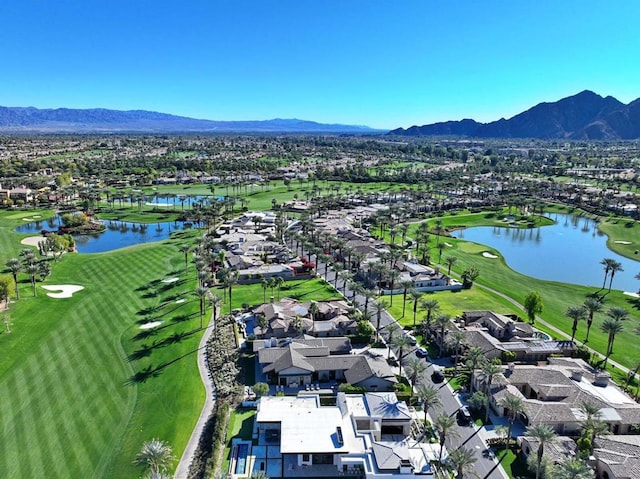 bird's eye view with a water and mountain view