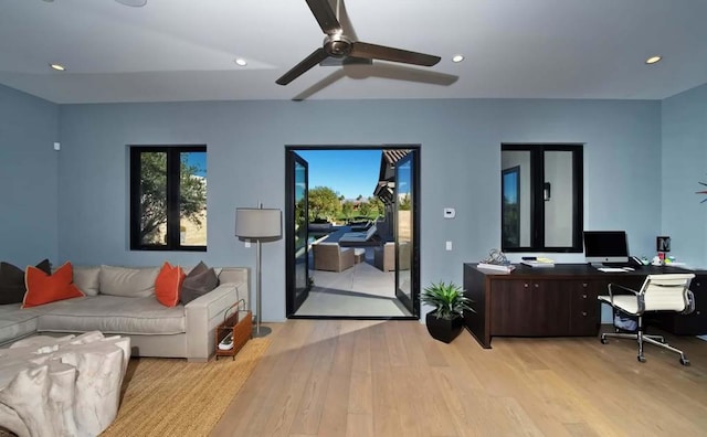 interior space featuring ceiling fan and light hardwood / wood-style floors